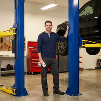 12,000 Lbs Two-Post Car Lift with 220V 4HP Motor & Single-Point Lock – Ideal for Shops, Garages & Heavy-Duty Vehicle Maintenance — Lifestyle